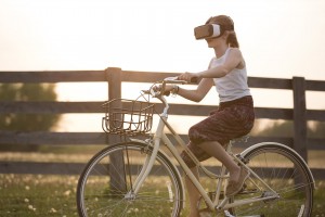 Girl riding bike, virtual reality