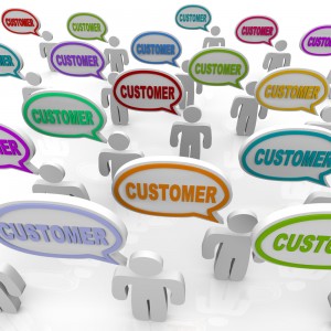 Many people speak with speech bubbles with the word Customer in them, illustrating the unique needs of different customers in a targeted market