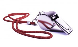 Metal whistle isolated on white